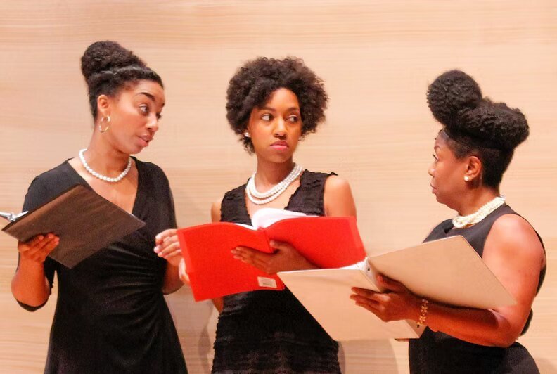 Playwrights reading scripts together