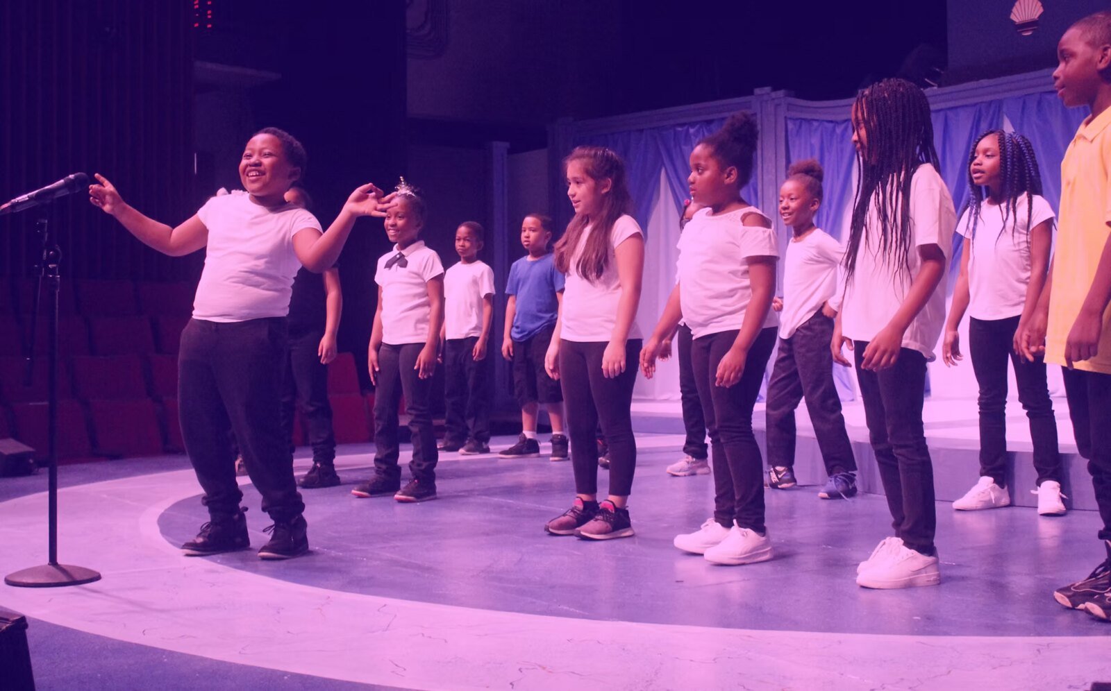 A youth choir performing on the Black Ensemble stage